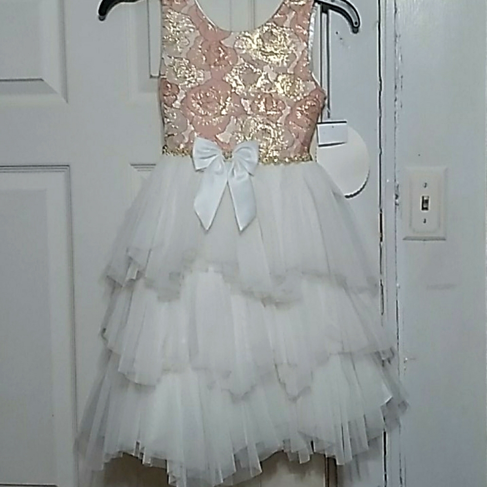 Girls dress coral, peachy, with gold design flower